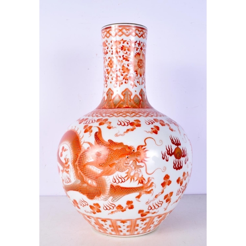 3112 - A Chinese porcelain Rouge De Fer Dragon vase 33cm.