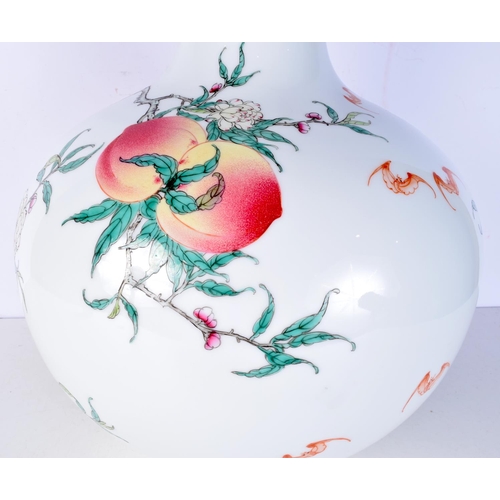 3113 - A Huge Chinese porcelain vase decorated in relief with Peach on a branch.55cm.