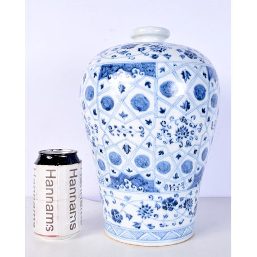 3117 - A Chinese porcelain blue and white MEIPING vase decorated with blossom and foliage 29cm