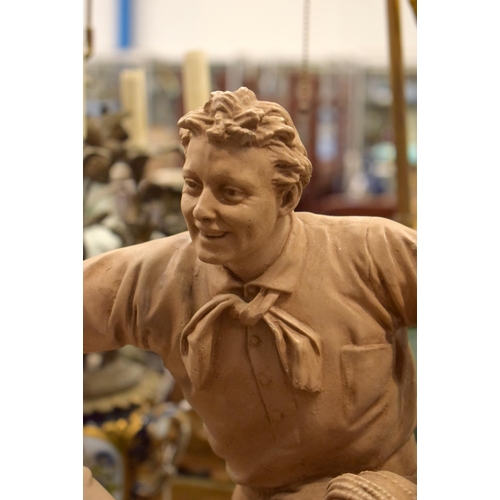 3876 - A LARGE AMERICAN TERRACOTTA FIGURE. 58 cm x 36 cm.