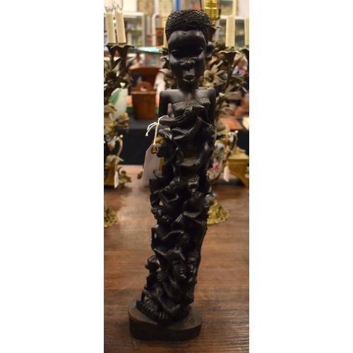 3877 - AN AFRICAN TRIBAL WOOD FIGURE. 60 cm high.