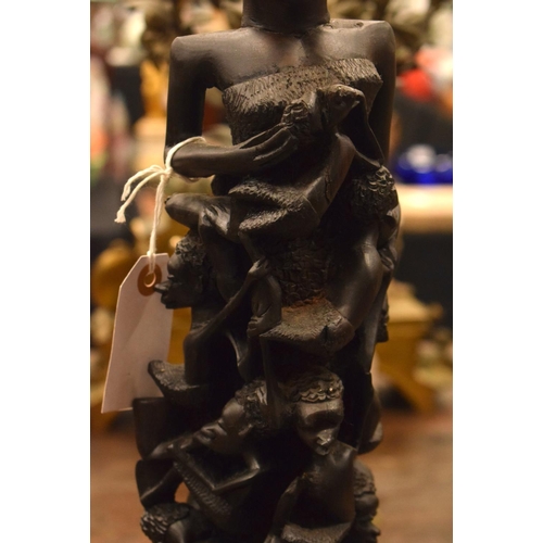 3877 - AN AFRICAN TRIBAL WOOD FIGURE. 60 cm high.