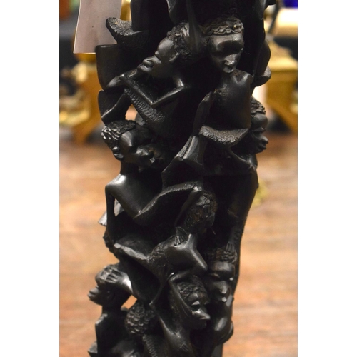 3877 - AN AFRICAN TRIBAL WOOD FIGURE. 60 cm high.