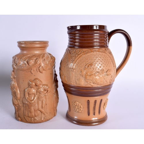 136 - AN ANTIQUE DOULTON STONEWARE MONK JUG together with a similar flask & a bowl with urn. Largest 25 cm... 