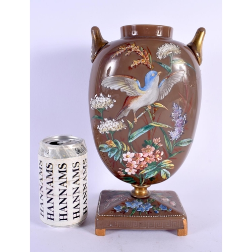 1 - A LARGE AESTHETIC MOVEMENT ENAMELLED TWIN HANDLED GLASS VASE decorated with birds and flowers. 27 cm... 