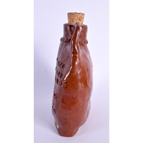 10 - AN EXTREMELY RARE UNIQUE WADE TWIN HANDLED POTTERY FLASK bearing personal inscription to the body. 1... 