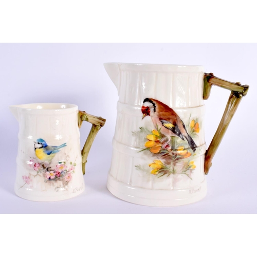 100 - Royal Worcester barrel shaped jug painted with a Goldfinch and another small jug painted with a Blue... 