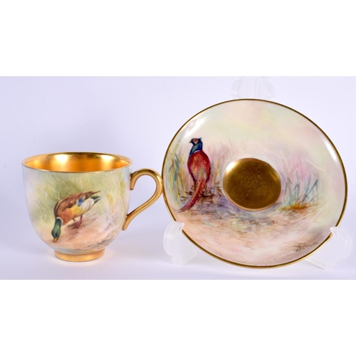 102 - Royal Worcester demi tasse cup and saucer painted with a Mallard or a Pheasant by P. Lynes, signed, ... 