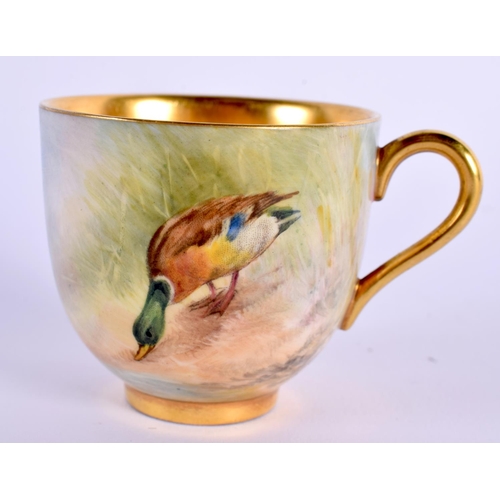 102 - Royal Worcester demi tasse cup and saucer painted with a Mallard or a Pheasant by P. Lynes, signed, ... 