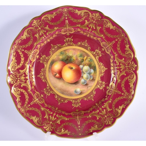 105 - Royal Worcester plate painted with fruit on a claret ground with rich raised gilding by F. Higgins, ... 