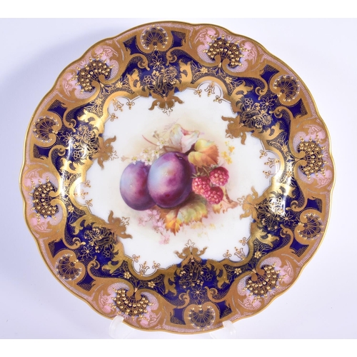 117 - Royal Worcester plate painted with fruit under a cobalt blue and gilt border by E. Phillips, signed ... 