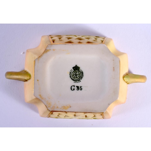 123 - Royal Worcester green and blush ivory reticulated two handled box and cover, date mark 1909 8.5x11cm