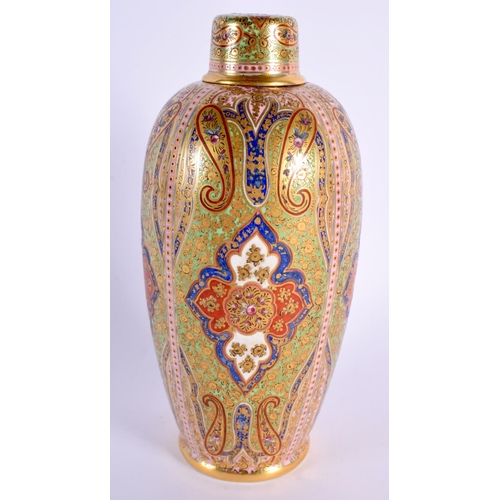 128 - Coalport jewelled bottle vase and cap cover painted with the Cashmere pattern in middle eastern ta... 