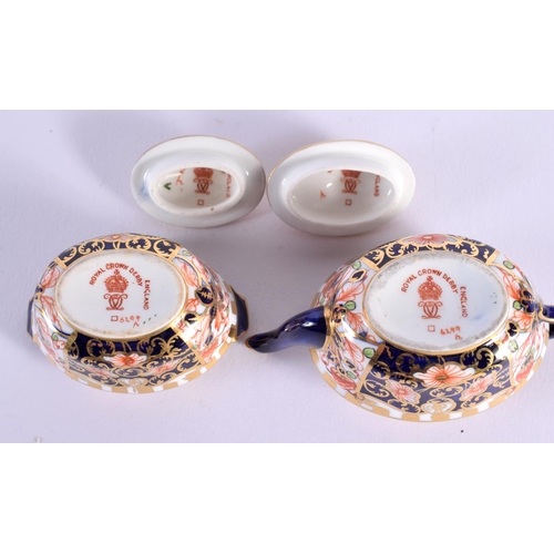 130 - Royal Crown Derby miniature tea service decorated in pattern 62 99 comprising a teapot and cover, su... 