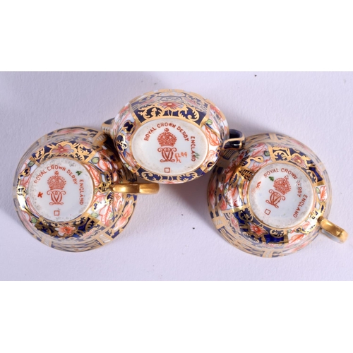 130 - Royal Crown Derby miniature tea service decorated in pattern 62 99 comprising a teapot and cover, su... 