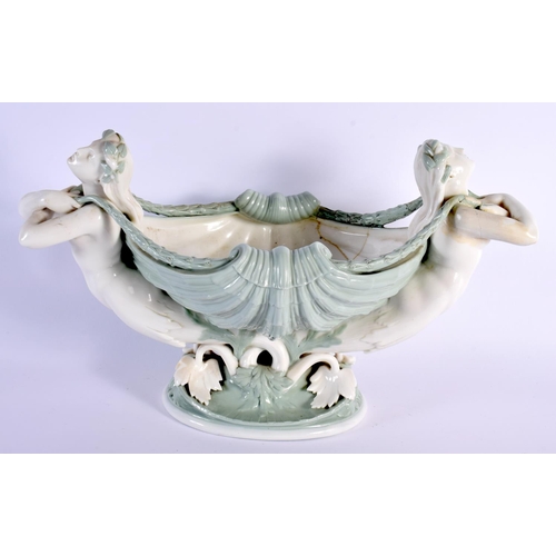 136 - Minton porcelain celadon shell basket support by two females, impressed marks, restoration  24x42cm