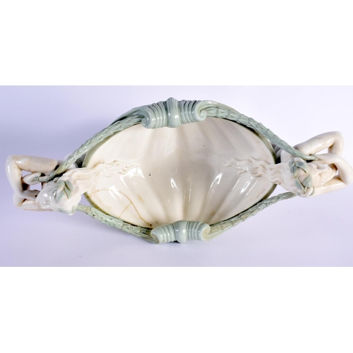 136 - Minton porcelain celadon shell basket support by two females, impressed marks, restoration  24x42cm