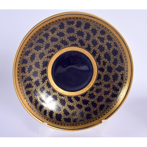 145 - Late 19th century Meissen cabinet cup and saucer in Sevres style, the dark blue ground with a gilt v... 