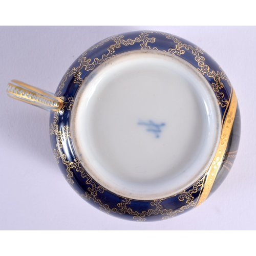 145 - Late 19th century Meissen cabinet cup and saucer in Sevres style, the dark blue ground with a gilt v... 