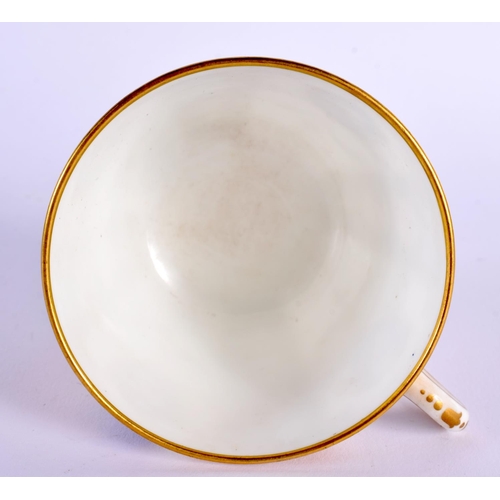 147 - Mid 19th century Minton cup and saucer with alternating acid etched gilt and white panels, gilt pane... 