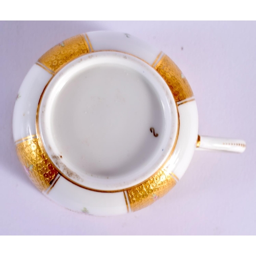 147 - Mid 19th century Minton cup and saucer with alternating acid etched gilt and white panels, gilt pane... 