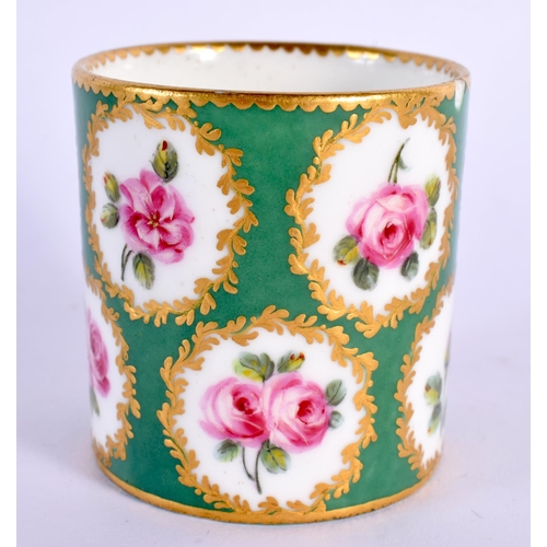 159 - Sevres coffee can with circular rose panels on a pomme verte ground, a Meissen coffee cup painted wi... 