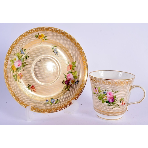 166 - Sevres coffee cup and saucer painted with flowers on a honeycomb gilded ground, marked S 58 in green... 