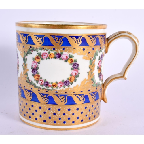 170 - Sevres coffee can painted with wreathes of roses surrounded by an elaborate blue and gilt ground,  C... 