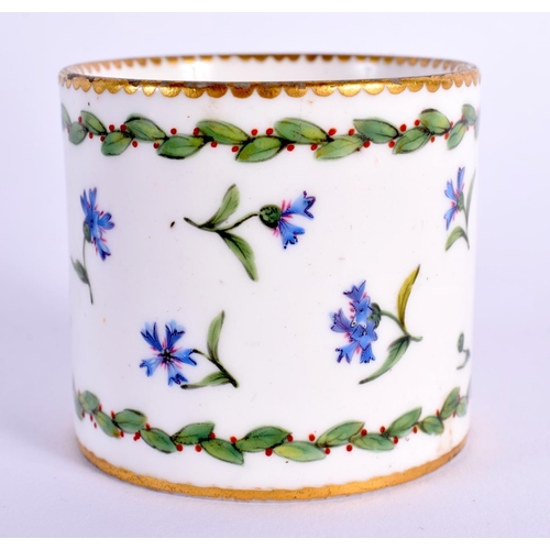 172 - Sevres small coffee can and stand painted with cornflowers and chains of berried leaves,  Crossed L... 