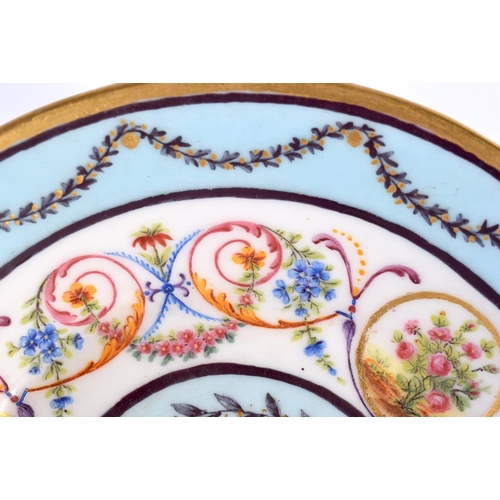 176 - Sevres stand for a coffee can painted with a neo-classical design on a light blue ground,  Crossed L... 