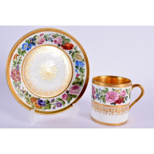 178 - Sevres coffee can and stand each painted with a wide foliate border, blue printed mark c. 1815-1824 ... 