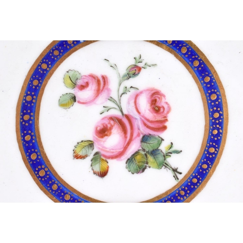 184 - Sevres plate painted with roses in a central roundel under a garland border, crossed Ls, date code ... 