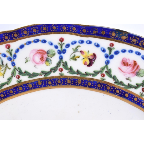 184 - Sevres plate painted with roses in a central roundel under a garland border, crossed Ls, date code ... 