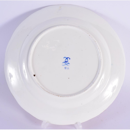 184 - Sevres plate painted with roses in a central roundel under a garland border, crossed Ls, date code ... 