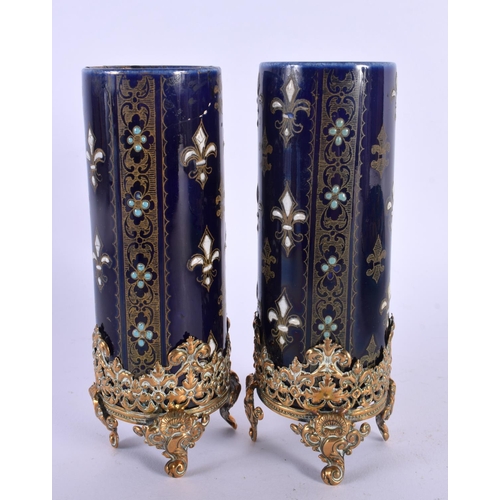 20 - A PAIR OF ANTIQUE FRENCH SEVRES STYLE JEWELLED VASE upon gilt metal mounts. 14 cm high.