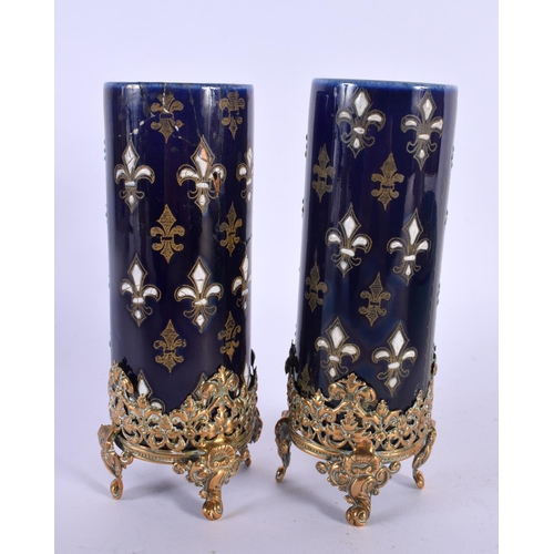 20 - A PAIR OF ANTIQUE FRENCH SEVRES STYLE JEWELLED VASE upon gilt metal mounts. 14 cm high.