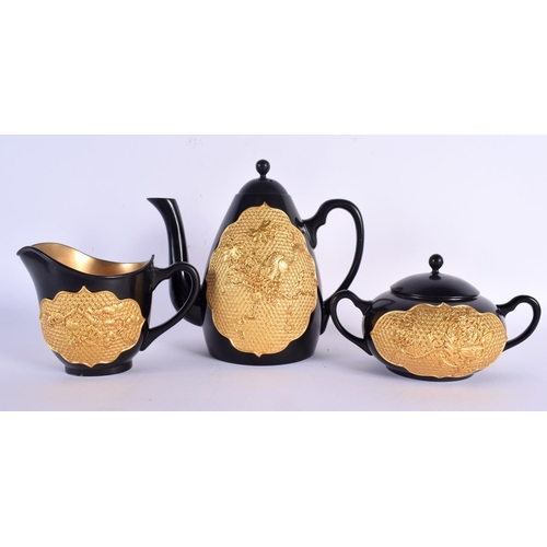 214 - A CHINESE REPUBLICAN PERIOD BLACK AND GOLD LACQUERED SERVING SET comprising of coffee pot, sugar bas... 