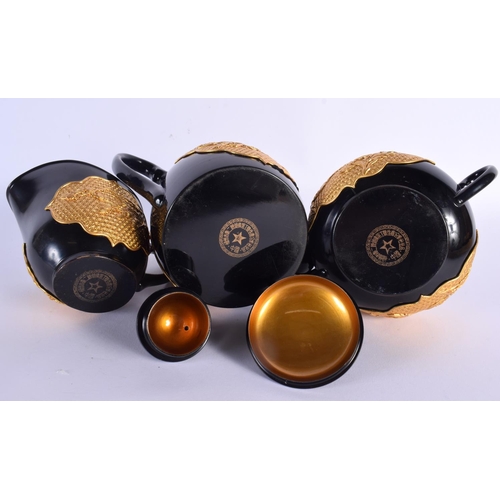 214 - A CHINESE REPUBLICAN PERIOD BLACK AND GOLD LACQUERED SERVING SET comprising of coffee pot, sugar bas... 