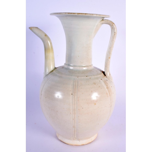 218 - A CHINESE QING DYNASTY QINGBAI EWER Sung Dynasty style, elegantly modelled with loop handle. 24 cm x... 