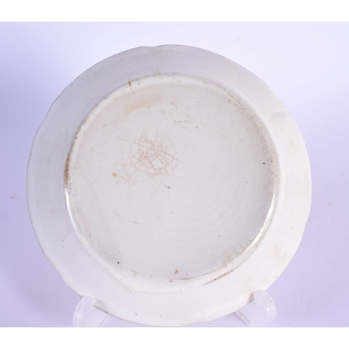 220 - A RARE CHINESE PALE CREAM GLAZED FOLIATE RIM DISH Song/Yuan dynasty. 13 cm wide. Note: See Sothebys,... 