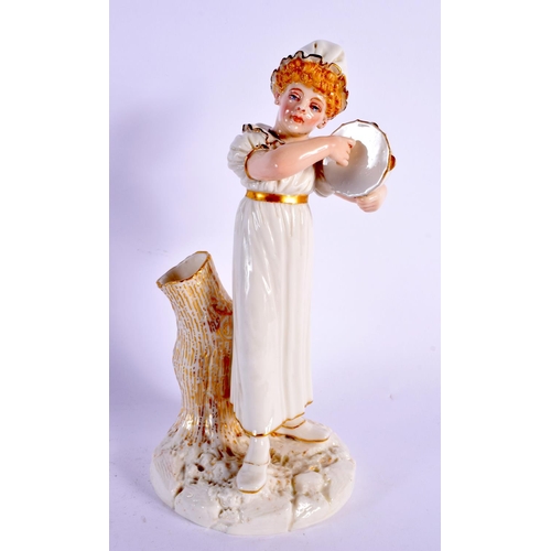 23 - A HADLEYS WORCESTER FIGURE OF A TAMBORINE PLAYER. 22 cm high.