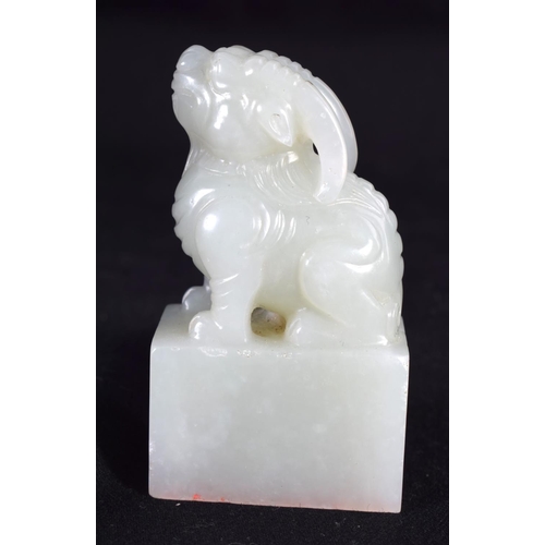 235 - A LOVELY 19TH CENTURY CHINESE CARVED WHITE JADE FIGURE OF A RAM elegantly modelled with head raised.... 