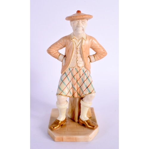 24 - A ROYAL WORCESTER FIGURE OF A SCOTSMAN. 15 cm high.