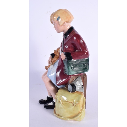 240 - A ROYAL DOULTON FIGURE 'THE GIRL EVACUEE' HN NO 3203. 20 cm high.