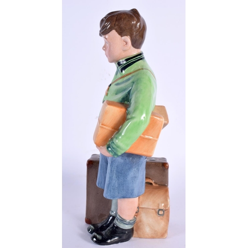 241 - A ROYAL DOULTON FIGURE 'THE BOY EVACUEE' HN NO 3202. 20 cm high.