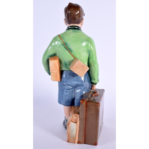 241 - A ROYAL DOULTON FIGURE 'THE BOY EVACUEE' HN NO 3202. 20 cm high.