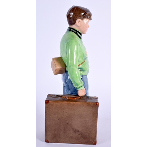 241 - A ROYAL DOULTON FIGURE 'THE BOY EVACUEE' HN NO 3202. 20 cm high.