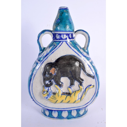 245 - A MIDDLE EASTERN PERSIAN BLUE GLAZED TWIN HANDLED POTTERY VASE decorated in relief with an elephant ... 