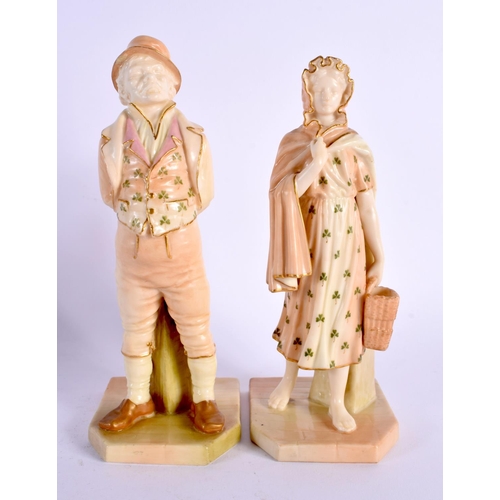 25 - A PAIR OF ROYAL WORCESTER FIGURE OF AN IRISH MAN AND WOMEN. 18 cm high.