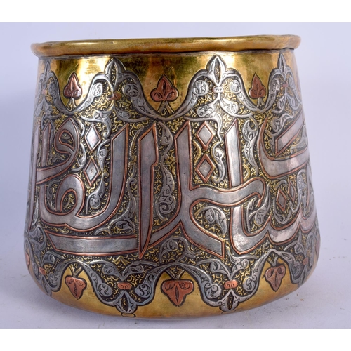 254 - AN ANTIQUE MIDDLE EASTERN CAIRO WARE BRASS BOWL decorated with Kufic script. 13 cm x 13 cm.